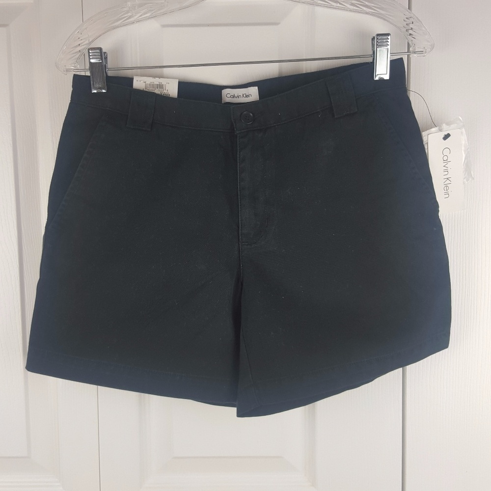 NWT Calvin Klein black shorts Size 4